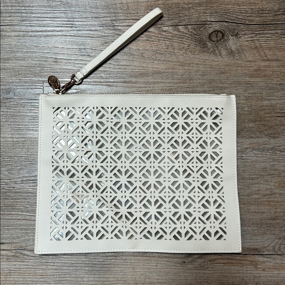 Tory Burch Handbags - Tory Burch white laser cut CLUTCH POUCH wristlet